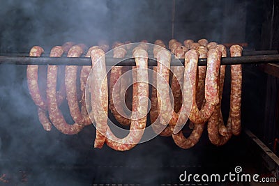 Homemade sausages in a traditional smoker Stock Photo