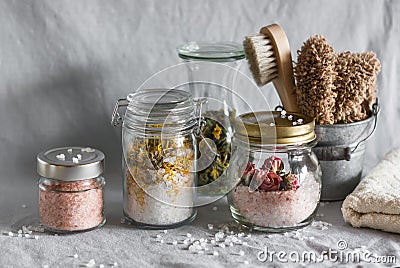 Homemade sea salt bath - calendula, pink himalayan, rose salt and bath accessories. Health, beauty, regeneration, skin cleansing c Stock Photo