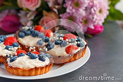 Homemade shortbread cake with whipped cream and fresh berries Stock Photo