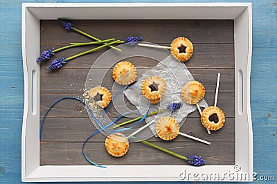 Homemade shortbread cookies with chocolate pops on tray Stock Photo