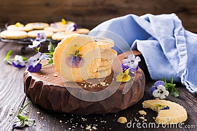 Homemade shortbread cookies with edible flowers Stock Photo