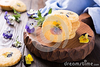 Homemade shortbread cookies with edible flowers Stock Photo
