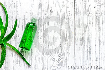 Homemade skin care. Aloe vera leafs, glass of aloe vera juice on wooden table background top view copyspace Stock Photo