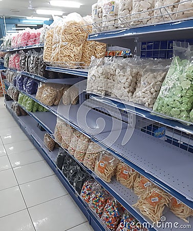 Homemade snacks on display at the mini market Editorial Stock Photo