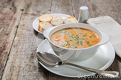 Homemade soup puree bisque with croutons. Copy-space. Stock Photo