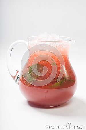 Homemade strawberry lemonade in a glass jug Stock Photo