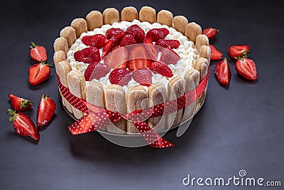 Homemade strawberry tiramisu cake on black Stock Photo