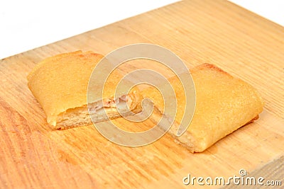 Homemade stuffed pancakes, wrapped with an envelope Stock Photo