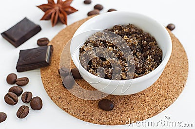 Homemade sugar, olive oil and ground coffee face and body scrub. Diy cosmetics. Stock Photo