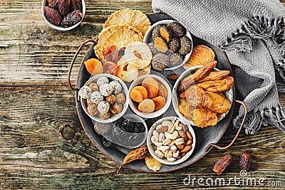 Homemade sweets from dried fruits without sugar and different nuts Stock Photo