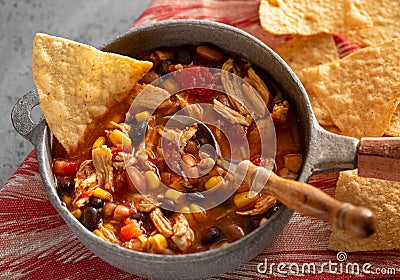 Homemade Taco Chicken Soup with Corn Chips Stock Photo