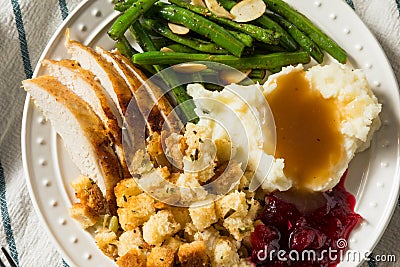 Homemade Thanksgiving Turkey Dinner with Stuffing Potatoes Stock Photo