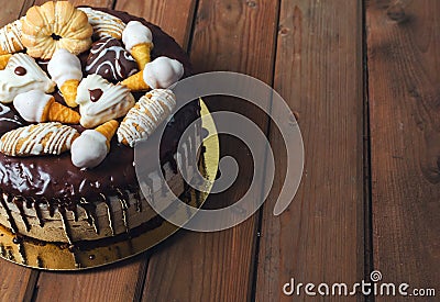 Homemade three chocolates cake with assorted cookies on top Stock Photo