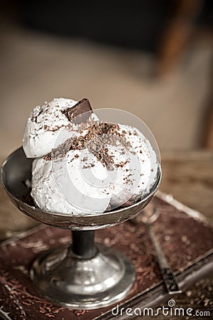 Homemade vanilla ice cream in vintage metal bowl Stock Photo