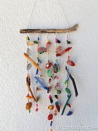 Homemade Wind Chimes from seashells with lovely colorfull touch of children Stock Photo