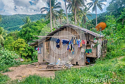 A homemade wooden house in the rural Philippines. Stock Photo
