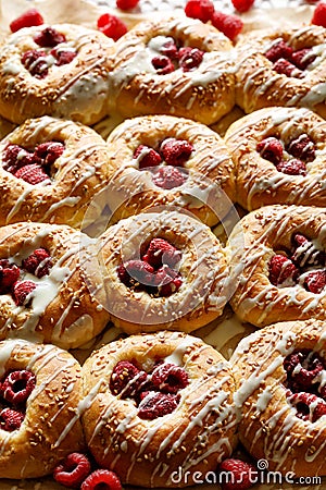 Homemade yeast buns with raspberries and white chocolate, close-up view Stock Photo