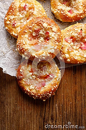 Homemade yeast sweet buns with rhubarb and crumble Stock Photo