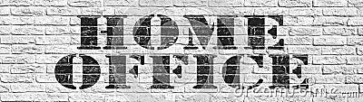 HOMEOFFICE background banner - Rustic old white painted brick stone wall masonry brickwork stonework texture with black font Stock Photo