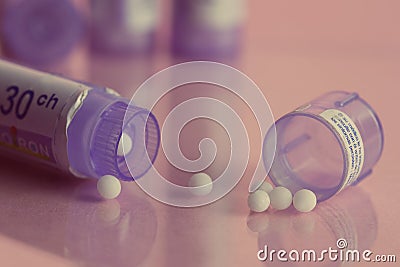 Homeopathic bottles and Pills Stock Photo