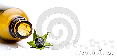 Homeopathy pills with belladonna isolated Stock Photo