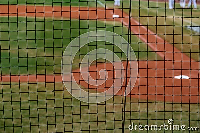 Homeplate at baseball field with focus on net Stock Photo