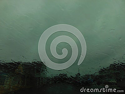 Homes Barely Visible Through Rain Stock Photo