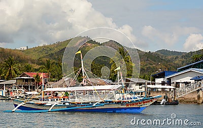 A Bangka, the traditional filipino boat. Santa Lourdes wharf. Honda Bay. Palawan. Philippines Editorial Stock Photo