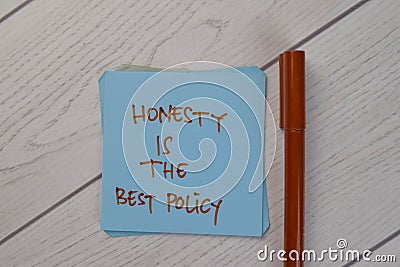 Honesty Is The Best Policy write on sticky notes isolated on Wooden Table Stock Photo