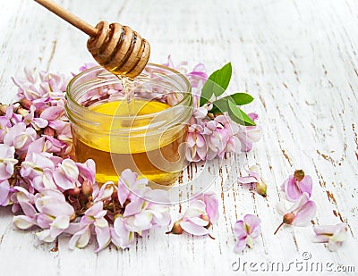 Honey with acacia blossoms Stock Photo