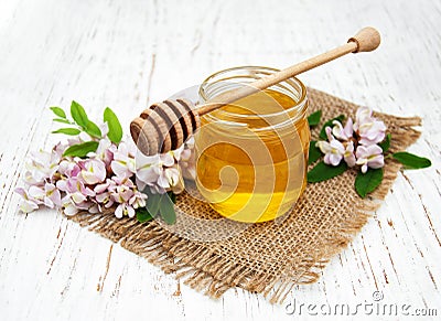 Honey with acacia blossoms Stock Photo