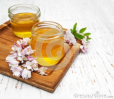 Honey with acacia blossoms Stock Photo