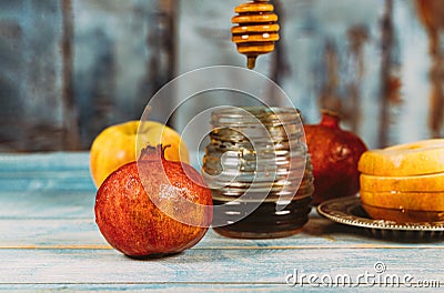 Honey, apple and pomegranate traditional holiday symbols rosh hashanah jewesh holiday Stock Photo