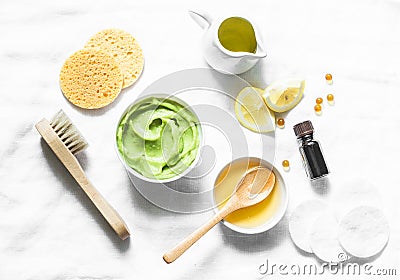 Honey and avocado face mask on light background, top view. Beauty, youth, skin care concept. Stock Photo