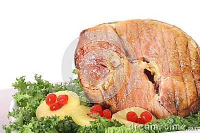 Honey baked ham with garnish Stock Photo