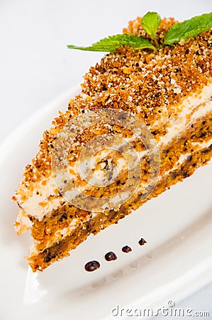 Honey cake plate with fresh mint leaf Stock Photo