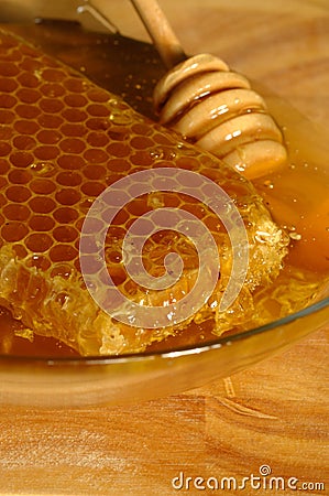 Honey comb and Drizzler Stock Photo