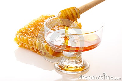 Honey dipper with honey Stock Photo