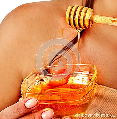 Honey facial mask with fresh fruits and honeycombs for hair . Stock Photo