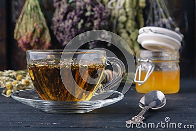 Honey and healing herbs for folk medicine, ethnoscience concept Stock Photo