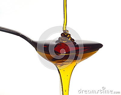 Honey pouring Stock Photo