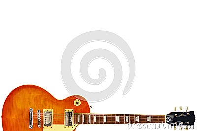 Honey sunburst vintage electric guitar at the bottom of white background, with plenty of copy space. Stock Photo