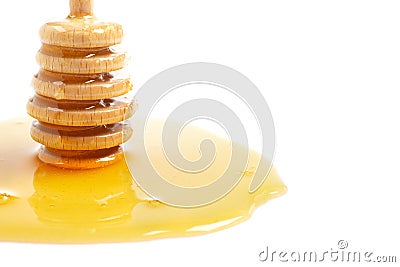 Honey and wooden drizzler Stock Photo