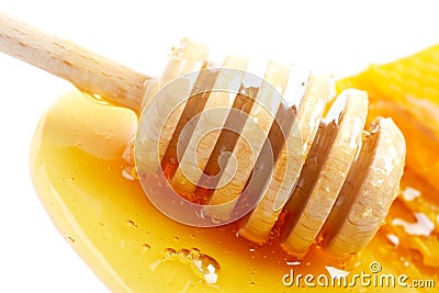 Honey and wooden drizzler Stock Photo