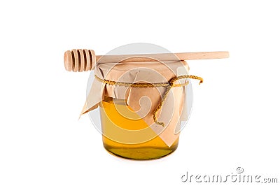 Honey wooden spoon isolated white. Stock Photo