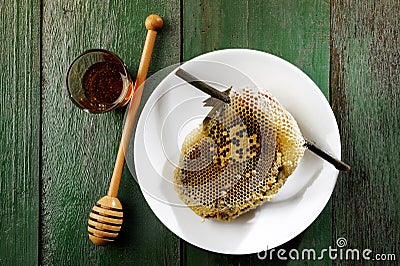 Honeycomb on white dish Stock Photo