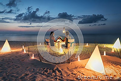 Honeymoon couple is having a private, romantic dinner Stock Photo