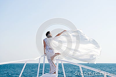 Honeymoon sea cruise. Things consider for wedding abroad. Wedding ceremony sea cruise. Bride adorable white wedding Stock Photo