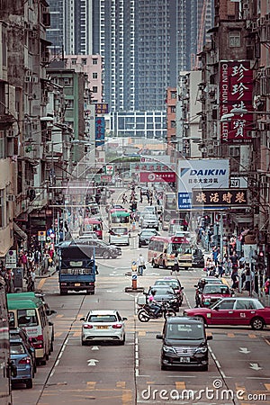 Hong Kong - 28 apr 2019: Old urban area, busy street in the middle of old residential buildings, Kowloon City, Hong Kong Editorial Stock Photo