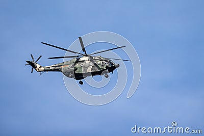People`s Liberation Army helicopters patrol over the sky of Hong Kong Editorial Stock Photo